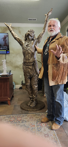 Sculptor Gary Lee Price with his statue of Timpanogos Chief Wakara