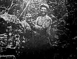  William E. Croff holding the skull of Timpanogos Chief Black after robbing his grave in 1919.