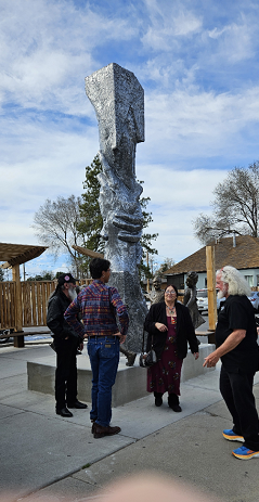 Artist Gary Lee Price with Timpanogos Chief Mary Meyer, Jose, and Carl, admiring the Statue of Responsibility by scultor Gary Lee Price. Photo taken at La Casita in Springville, Utah.