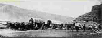 Historical photo of wagon train.